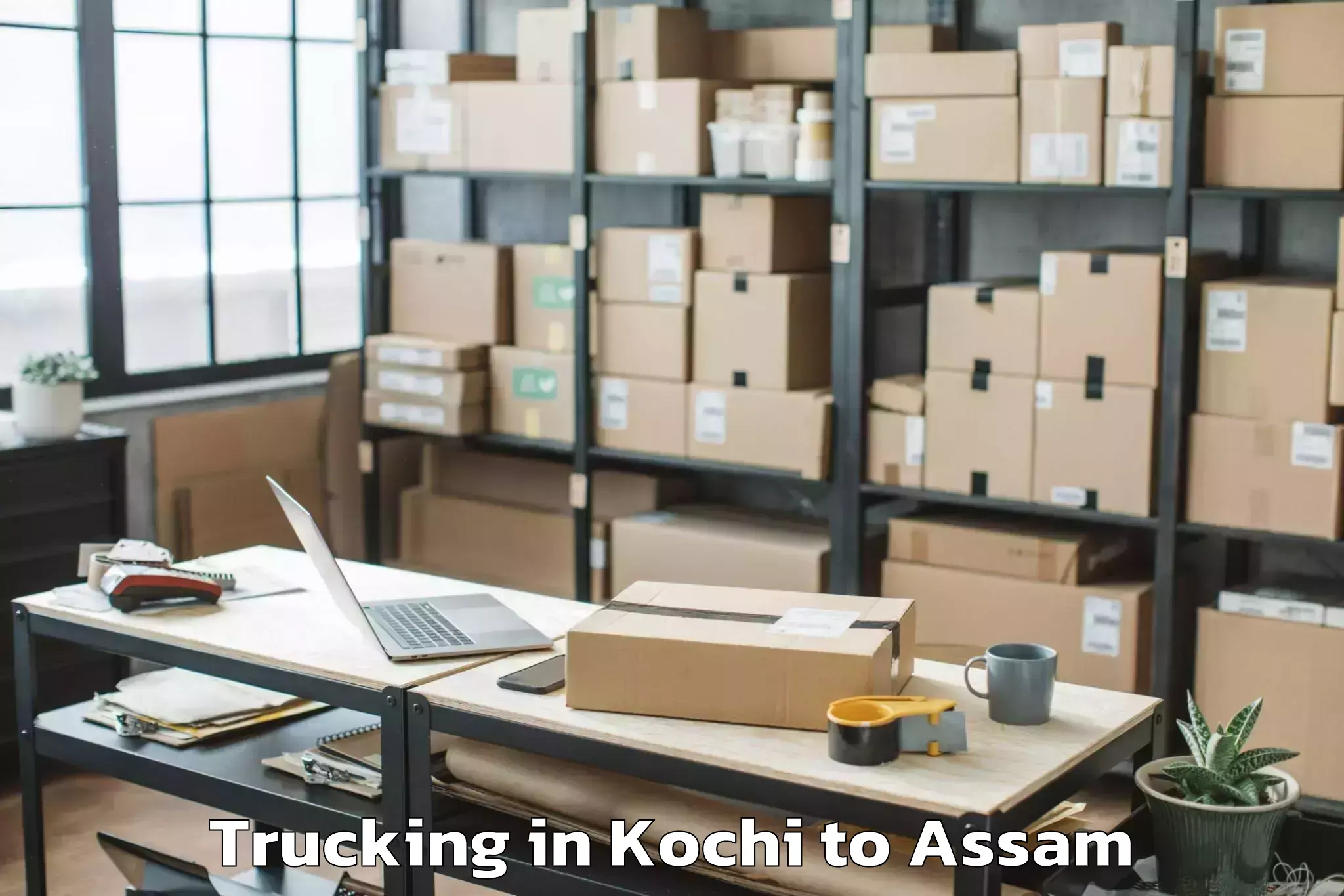 Book Kochi to Khoirabari Trucking